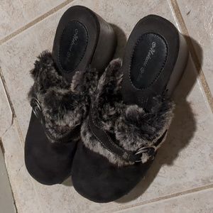 Furry black clogs